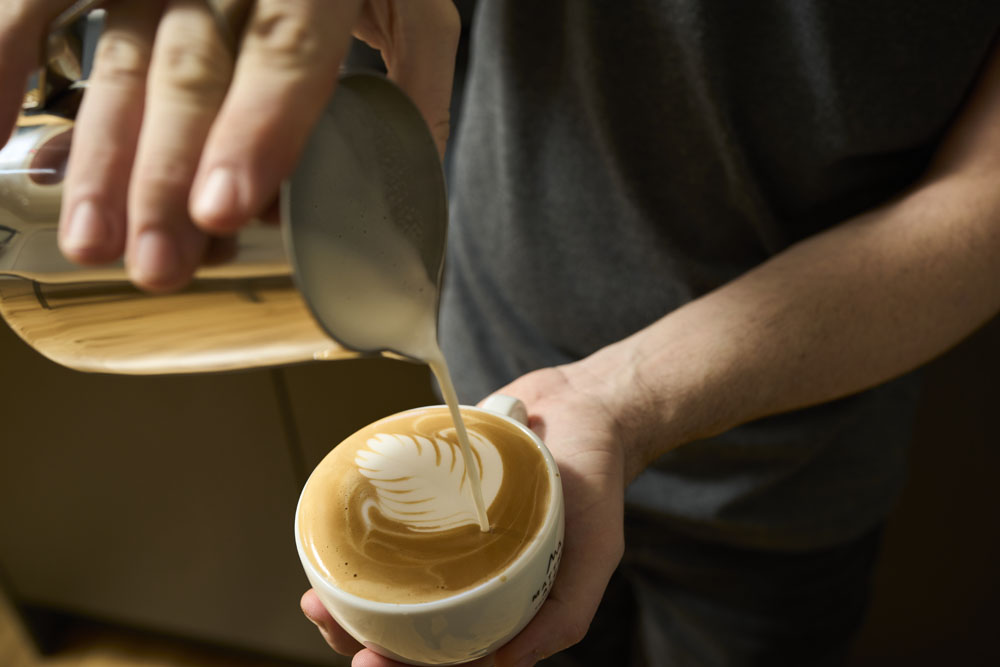 Latte being poured