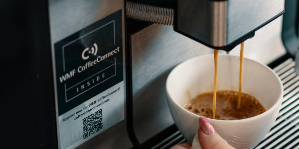WMF 5000 S+ Bean to cup coffee machine pouring an espresso