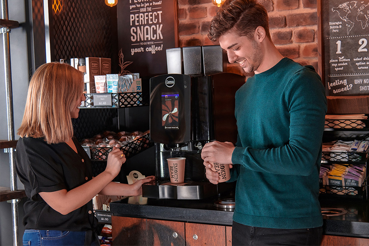 Customers drinking smokin bean coffee